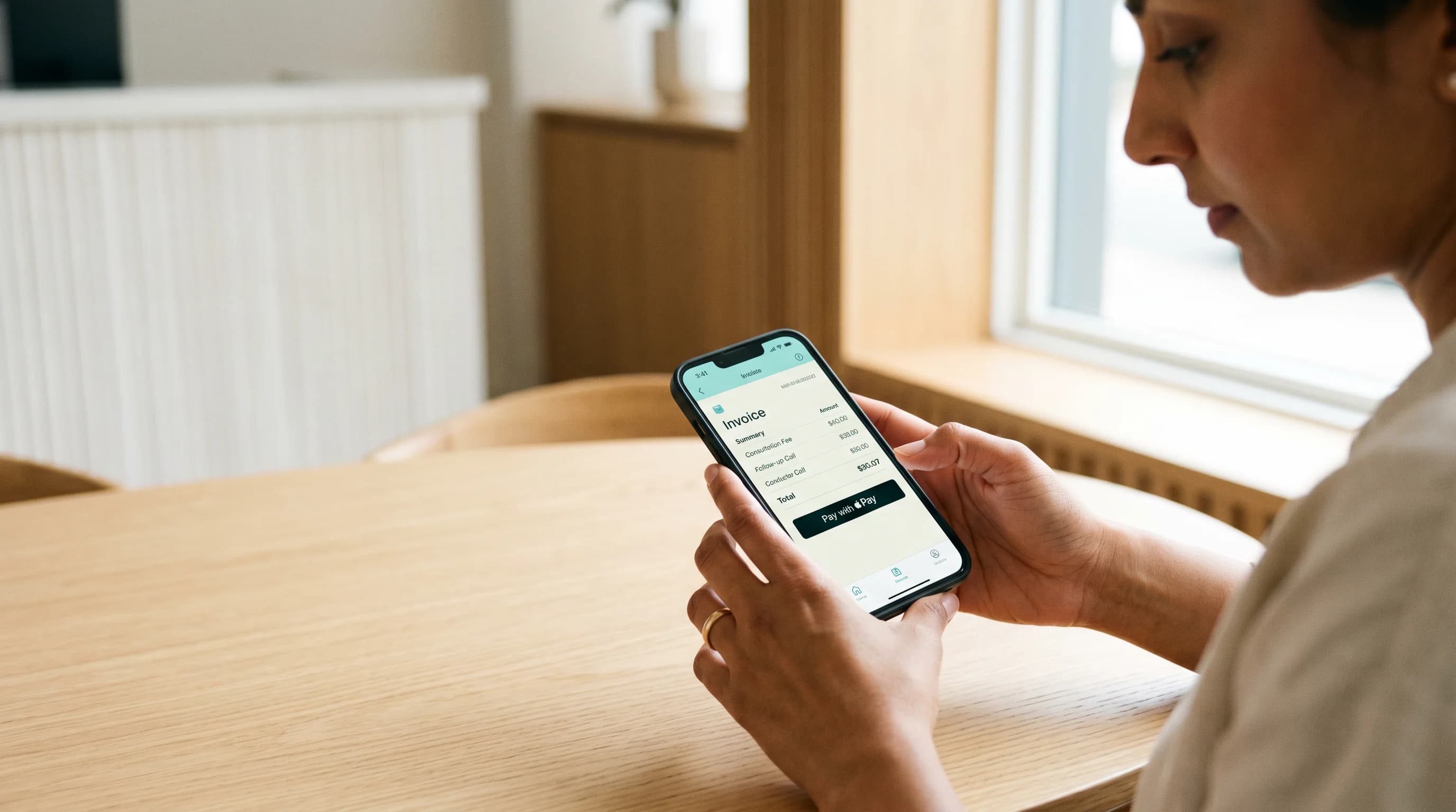 A patient paying through their phone with a single tap